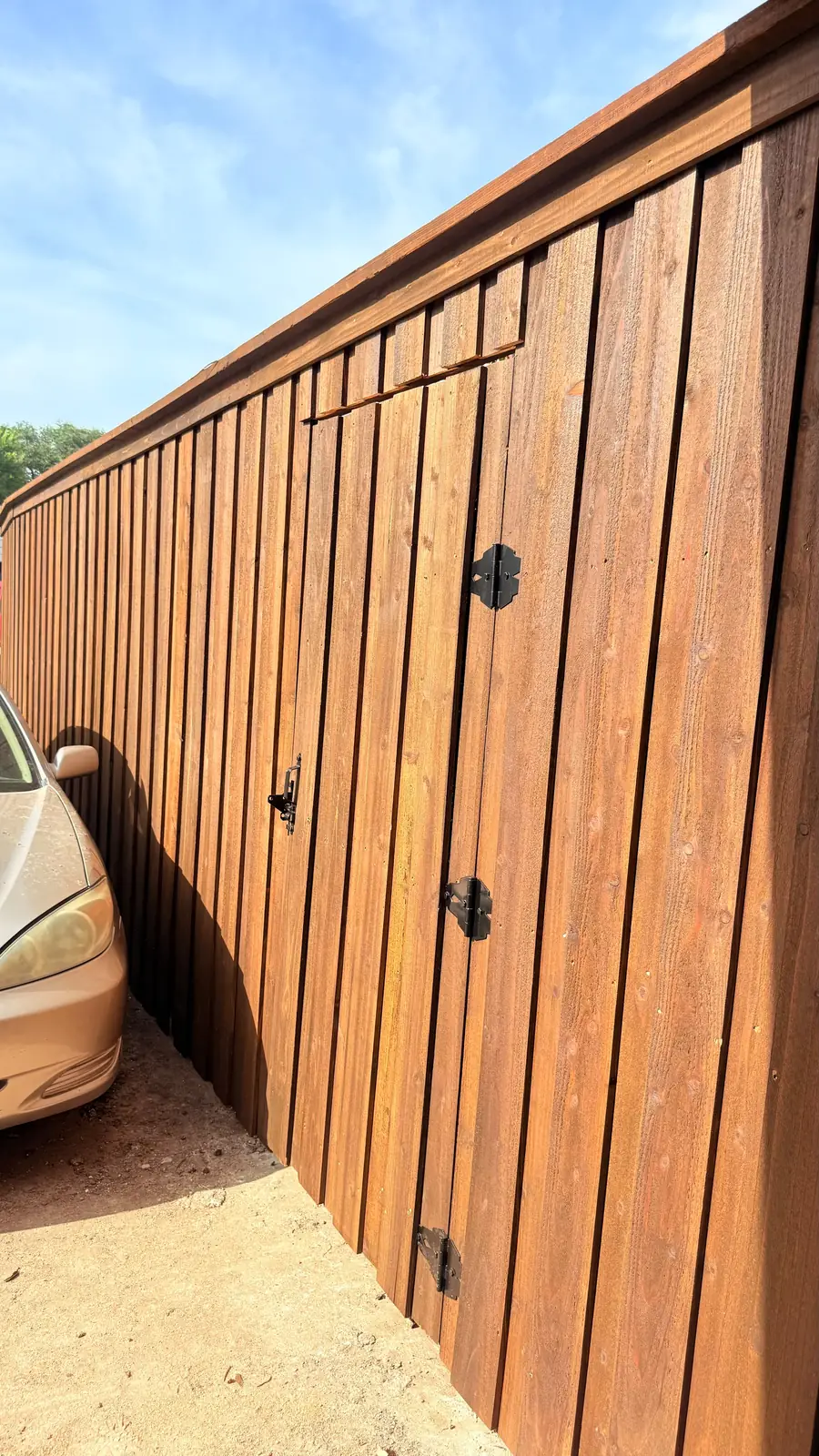 Built-in walk gate on heavy hinges, stained to match